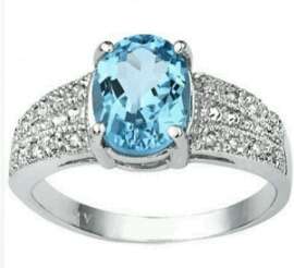 DAZZLING 2.4 CT BLUE TOPAZ & 2 Pcs White Diamond Sterling Silver Ring with Platinum Coat.
