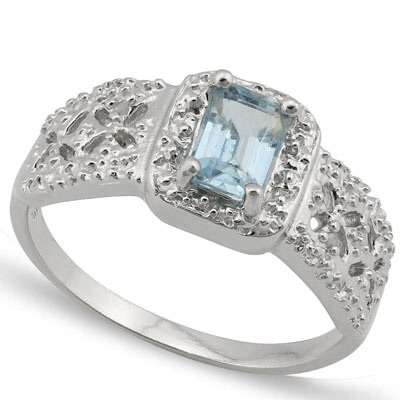 Stunning 0.532 Ct Blue Topaz and Diamond sterling  Silver Ring with Platinum Coat.    size 7