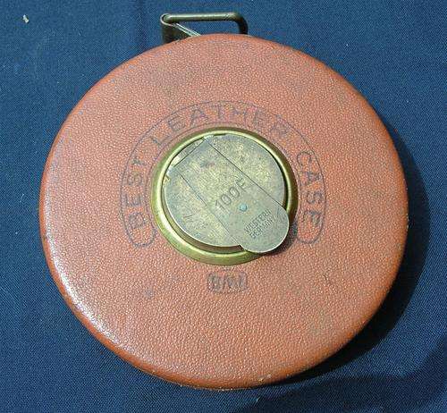 Vintage leather tape measure 100Feet, steel tape, BMI, made in Western Germany, see pics, and disc.