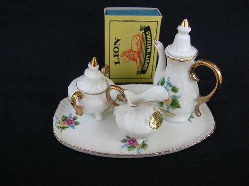 Ucago Japan Vintage bone china. Miniature tea set 3 piece on tray condition very good