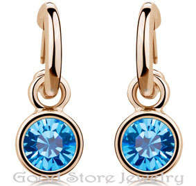 STRIKING BLUE TOPAZ SWAROVSKI EARRING IN 18K WHITE GOLD CLAD