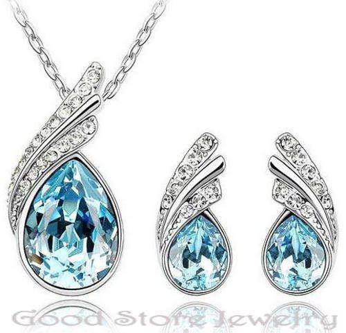DAZZLING BLUE TOPAZ SWAROVSKI ACCESSORIES SET IN 18K WHITE GOLD CLAD