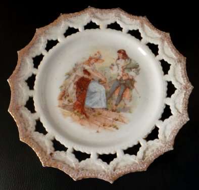 STARTING R1,00 Beautifully Decorative Plate Depicting 2 Figures in Yesteryear Dress - 200mm Across