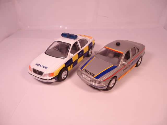 Realtoy/Tin Toys - Lot of 2 Models