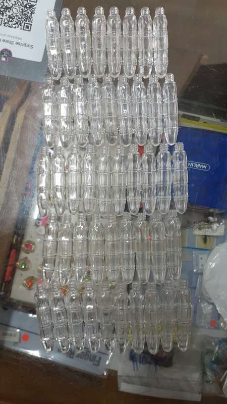 Collectable Small Glass Bottles - Hexagonal bullet-shaped