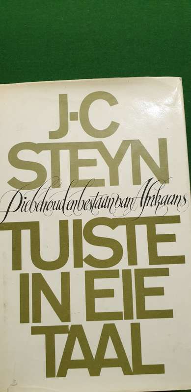 Tuiste in eie taal. Die behoud en bestaan van Afrikaans. JC Steyn.