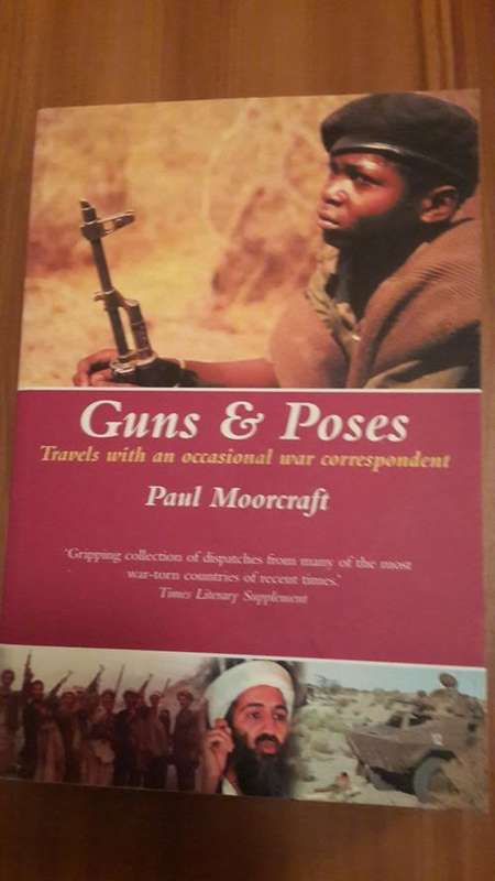 Guns and poses. Travels with an occasional war correspondent by Paul Moorcraft