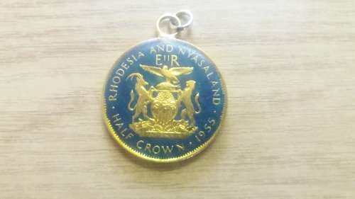 1955 Rhodesia and Nyasaland gilded & enamelled Half Crown Pendant