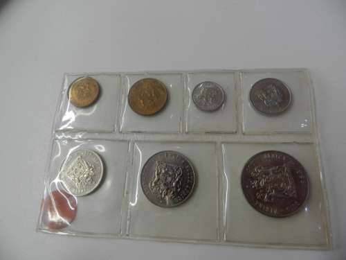 Coins: South African collectable uncirculated Mint set in plastic sealed pouch.  A 1983 full set