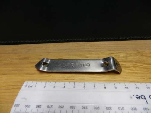 Vintage Bar metal bottle opener marked LION with SAB BADGE.