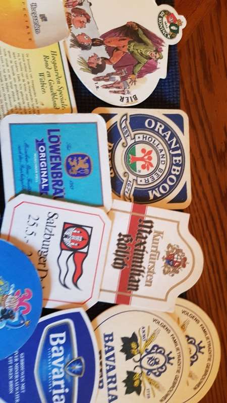 Collection of European Beer Brand Coasters from the 1980s onward.