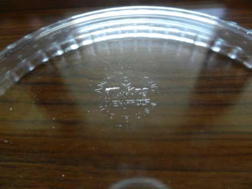 Anchor Hocking glass pie plate.  Made in USA ovenware.  A round pie dish with scalloped edges