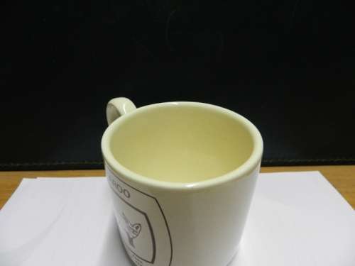 Karoo National Park souvenir: Small mug with handle ceramic off white with brown inscription of Bat