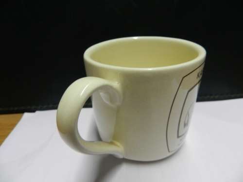 Karoo National Park souvenir: Small mug with handle ceramic off white with brown inscription of Bat