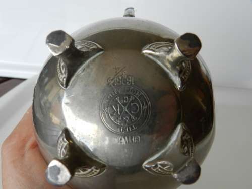Antique Milk jug. Silver plated with mark reading  giftvrij Tiel Holland