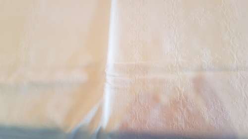 Rectangular White with a hint of yellow Damask Table Cloth, hemmed.