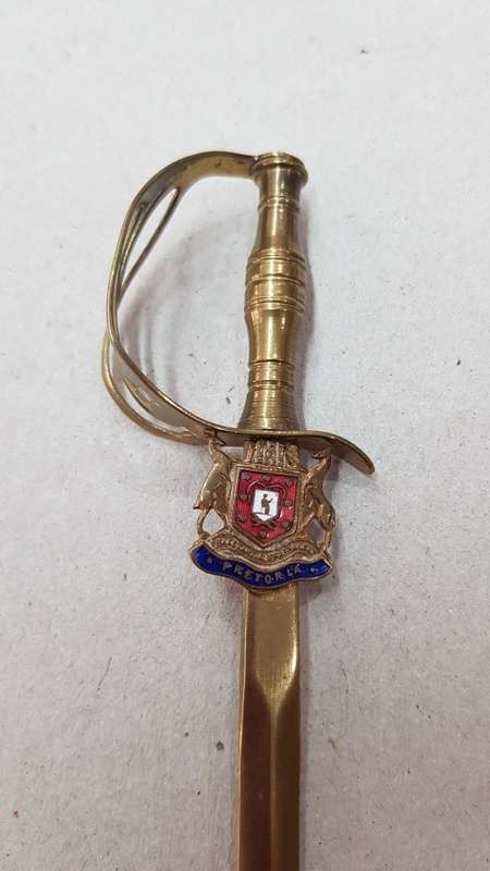 Vintage Brass Ornament:  Brass sword shaped letter opener with Town weapon PRETORIA.