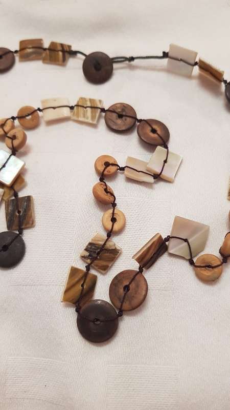 Costume Jewellery:  Necklace strung with brown and beige discs and bone squares on string.