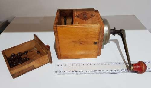 Antique Coffee Grinder: Rustic wooden coffee grinder