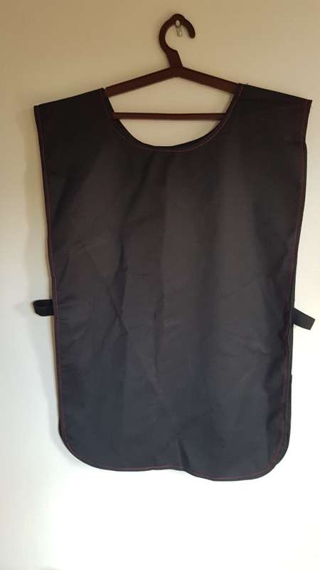 Pinafore type double sided apron. Black