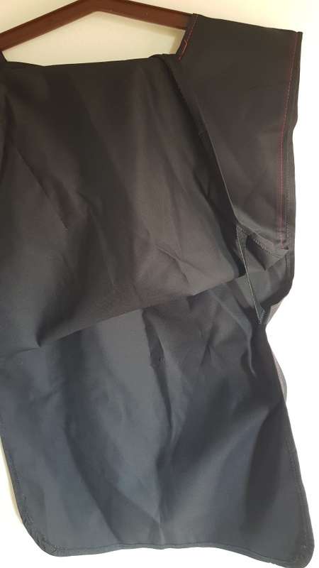 Pinafore type double sided apron. Black
