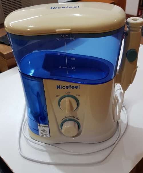 Electric Dental/Oral Irrigator Flosser.