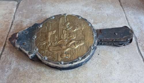 Antique Bellows. Wood covered in leather with round embossed brass plate