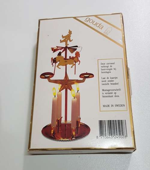 Vintage Christmas decoration.  Santas candle carousel.  Made in Sweden.