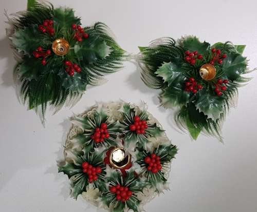 Vintage Christmas decoration. Christmas themed plastic mistletoe candle holders.
