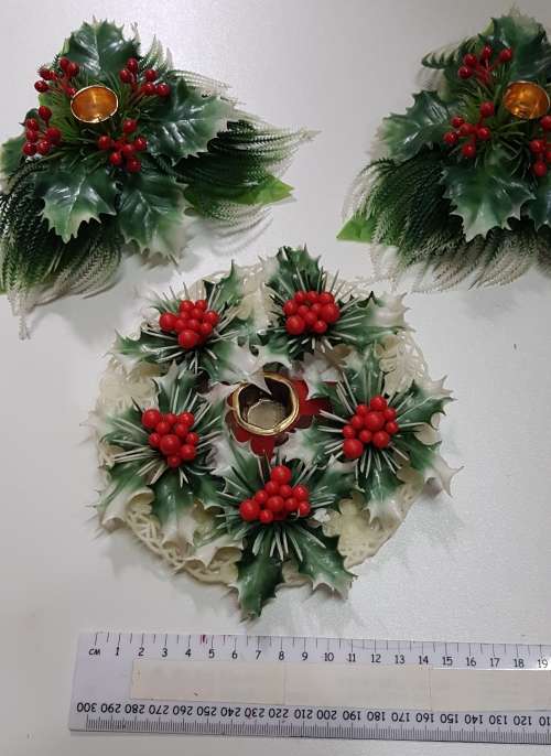 Vintage Christmas decoration. Christmas themed plastic mistletoe candle holders.