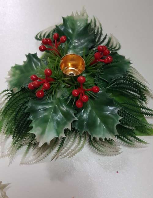 Vintage Christmas decoration. Christmas themed plastic mistletoe candle holders.