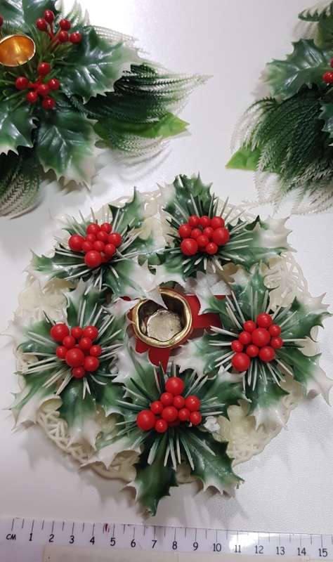 Vintage Christmas decoration. Christmas themed plastic mistletoe candle holders.