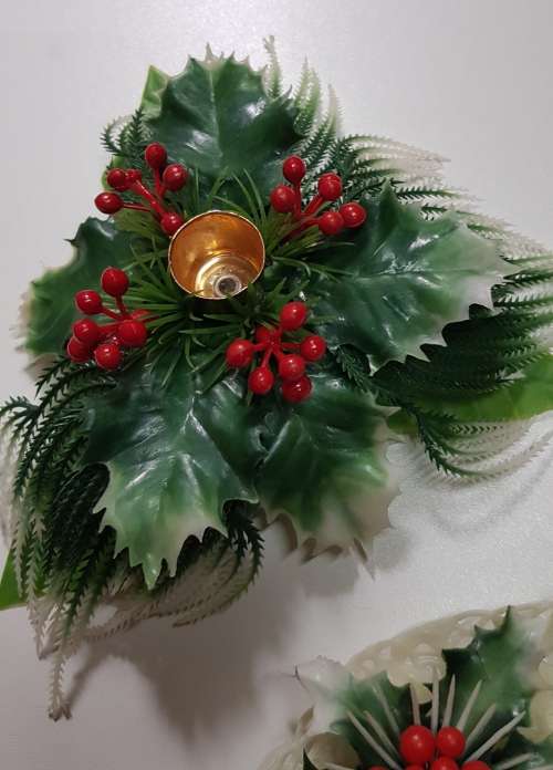 Vintage Christmas decoration. Christmas themed plastic mistletoe candle holders.