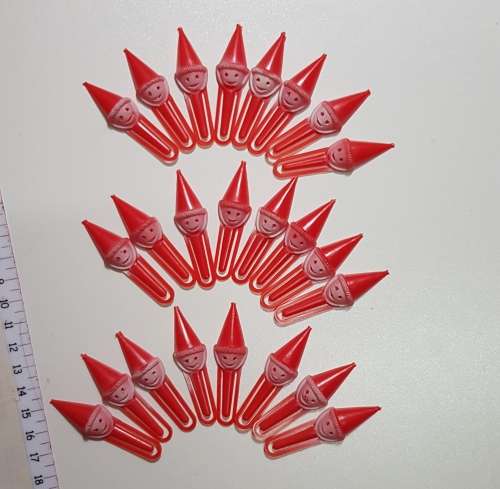 Vintage Christmas decorations. Father Christmas plastic clips.