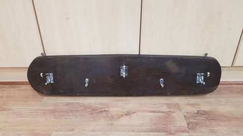Vintage wall mounted Coat Rack.  Hanging storage for Coats, clothes, and hats.