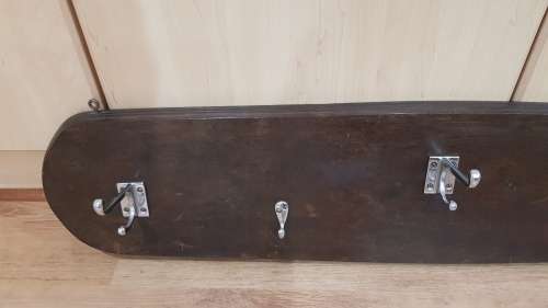 Vintage wall mounted Coat Rack.  Hanging storage for Coats, clothes, and hats.