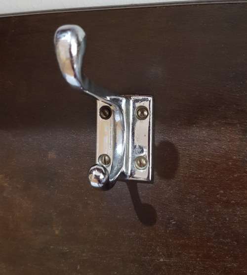Vintage wall mounted Coat Rack.  Hanging storage for Coats, clothes, and hats.