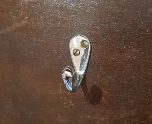 Vintage wall mounted Coat Rack.  Hanging storage for Coats, clothes, and hats.