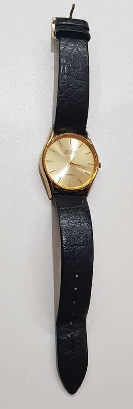 Vintage Mens watch / Astro Quartz.  c1970s.  Gold plated, round face with black leather strap.