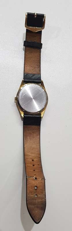 Vintage Mens watch / Astro Quartz.  c1970s.  Gold plated, round face with black leather strap.