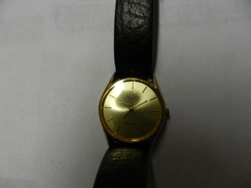 Vintage Mens watch / Astro Quartz.  c1970s.  Gold plated, round face with black leather strap.