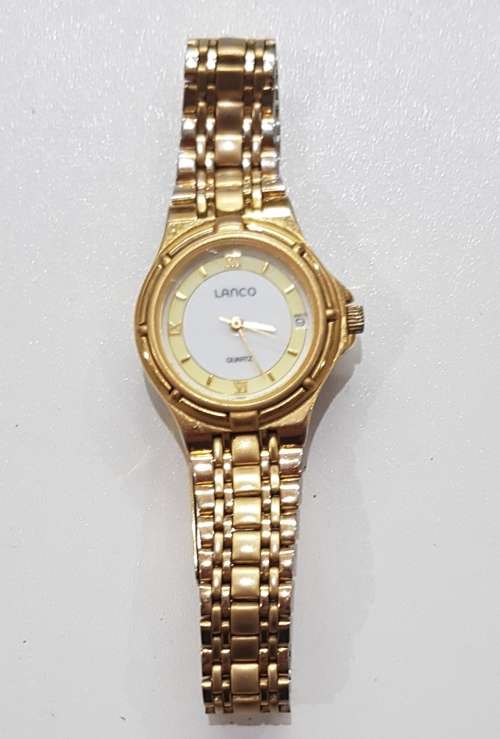 Ladies Lanko Quartz wrist watch. c1990s.  Gold plated with round face and original strap and clasp.