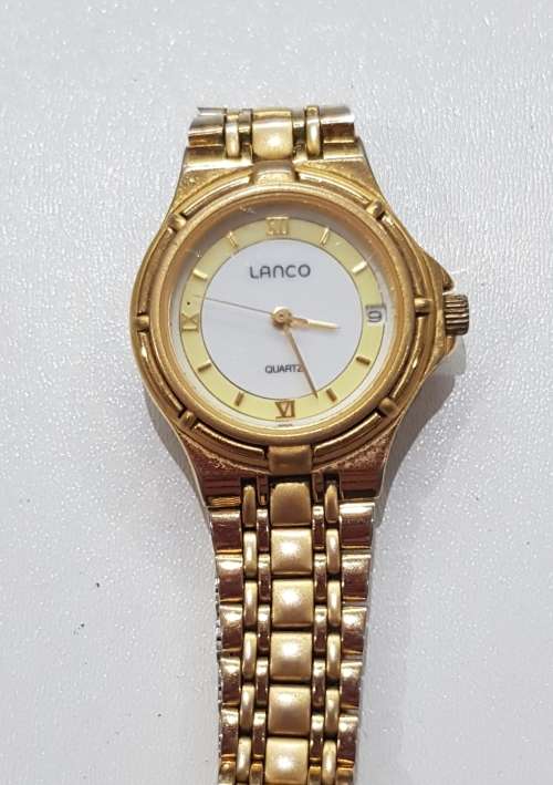 Ladies Lanko Quartz wrist watch. c1990s.  Gold plated with round face and original strap and clasp.