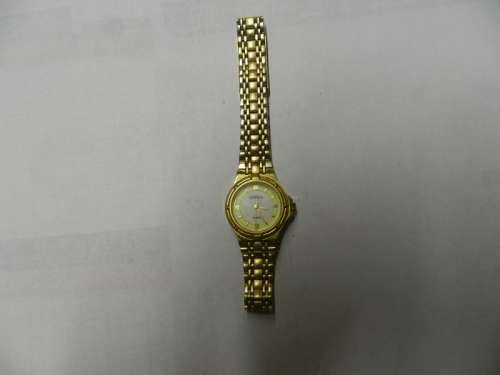 Ladies Lanko Quartz wrist watch. c1990s.  Gold plated with round face and original strap and clasp.