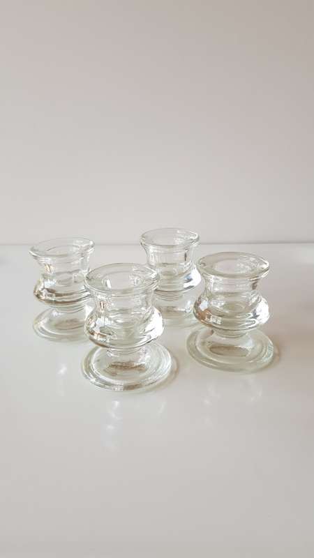 Set of 4x Pedestal type Glass Candle Holders. Round base