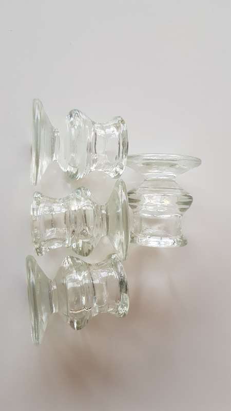 Set of 4x Pedestal type Glass Candle Holders. Round base