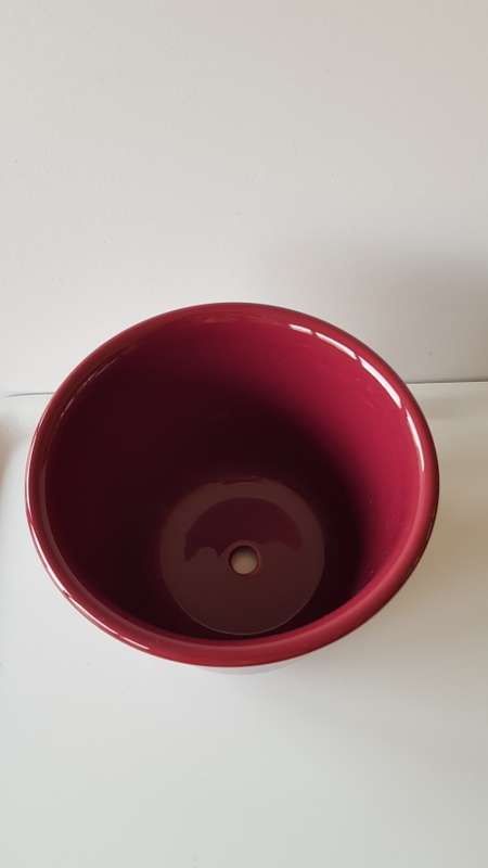 Indoor flower pot/planter. Large Ceramic glazed flower pot. Maroon with drainage hole.