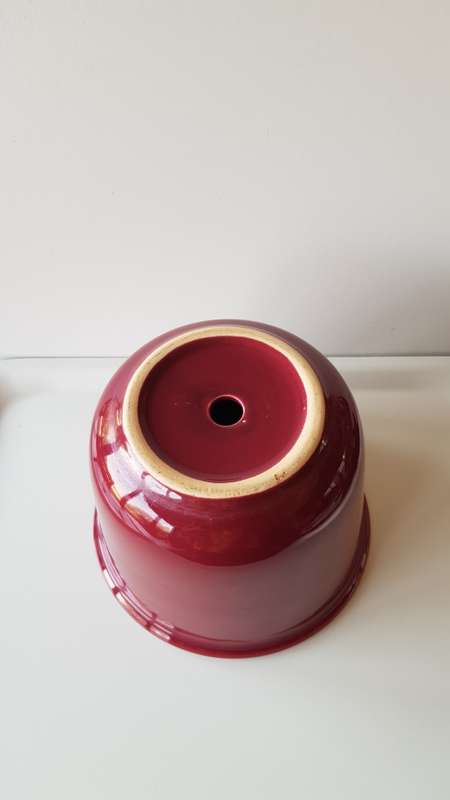 Indoor flower pot/planter. Large Ceramic glazed flower pot. Maroon with drainage hole.