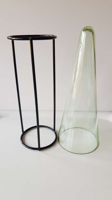 Glass Flower vase. Large glass vase, funnel shaped and mounted on smooth round wrought iron base.