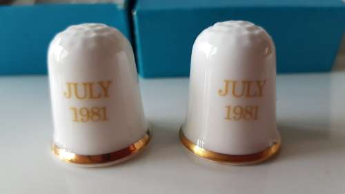 A Coalport Fine Bone China collectors thimble set of 2x. The Royal Wedding July 1981.